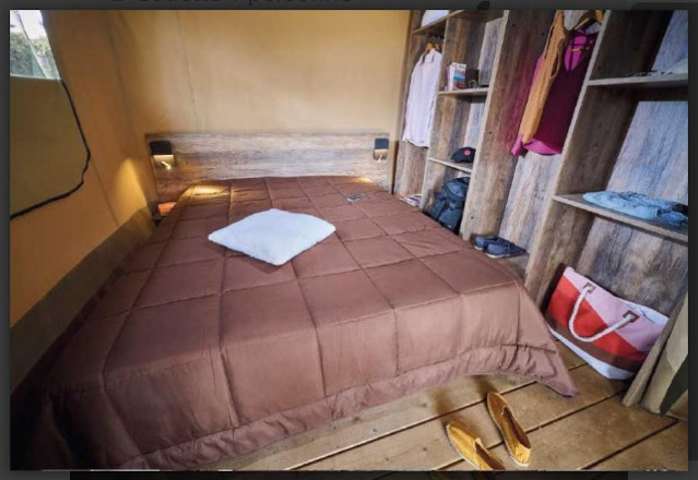 Master bedroom of the Kenya tent, in rental unusual accommodation at camping les Amandiers in the Hérault